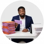 A photo of a man receiving performance feedback in the mail instead of instantly from his manager.