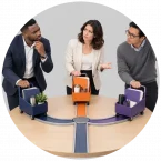 A team of people using project management to coordinate activities.